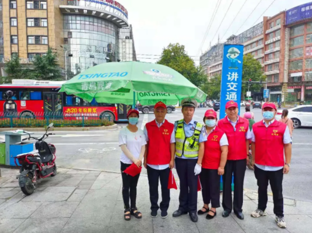 九江CQ9电子_官网 组织志愿者参加文明交通志愿服务